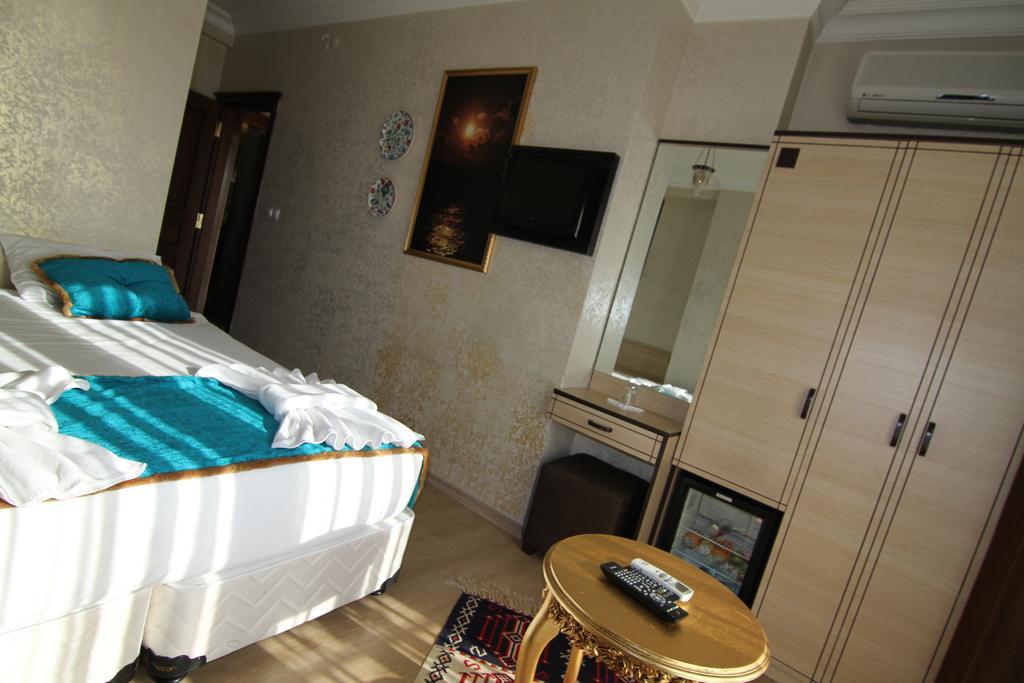 Deluxe tweepersoonskamer met balkon en uitzicht op zee