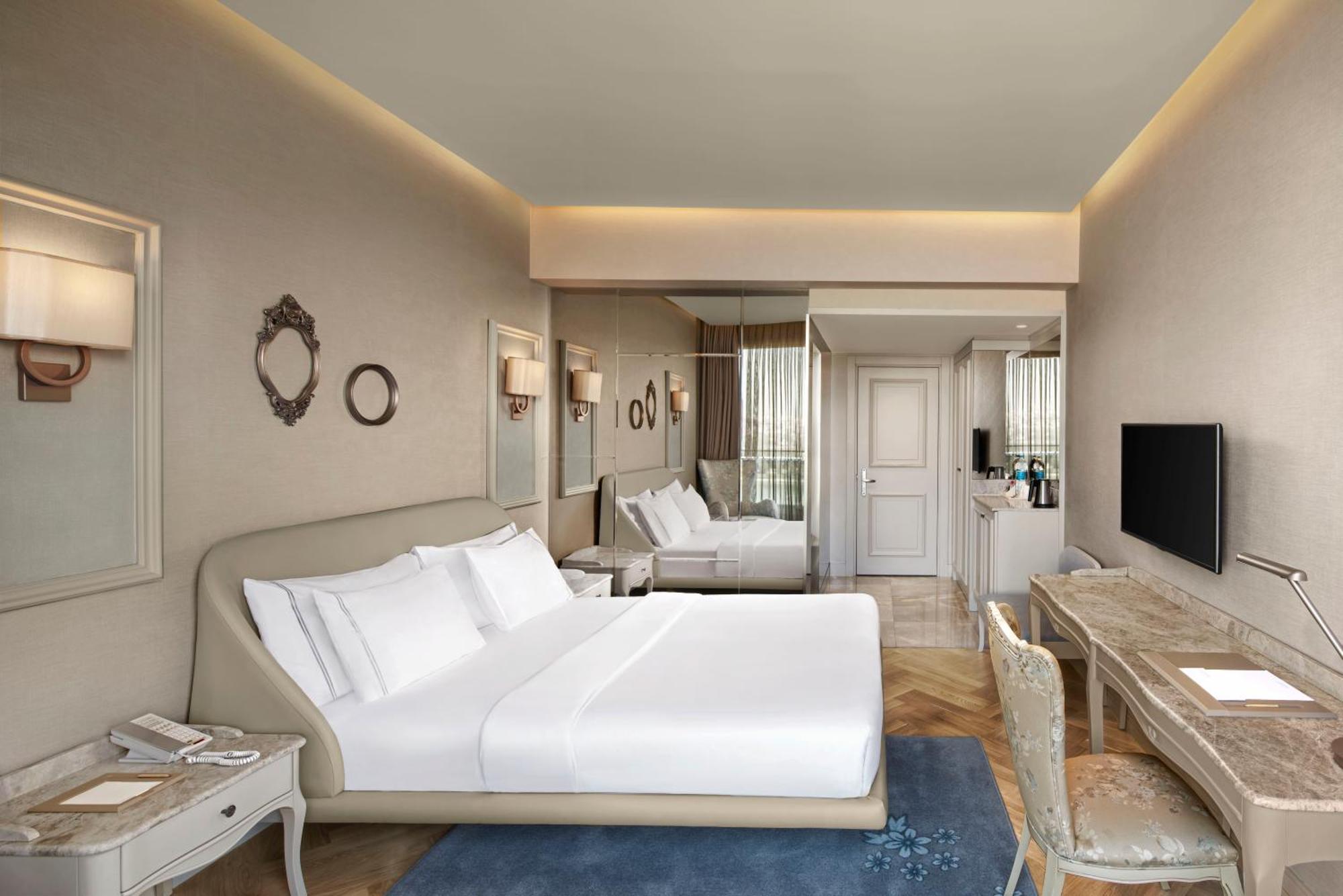 Deluxe tweepersoonskamer met balkon en uitzicht op zee