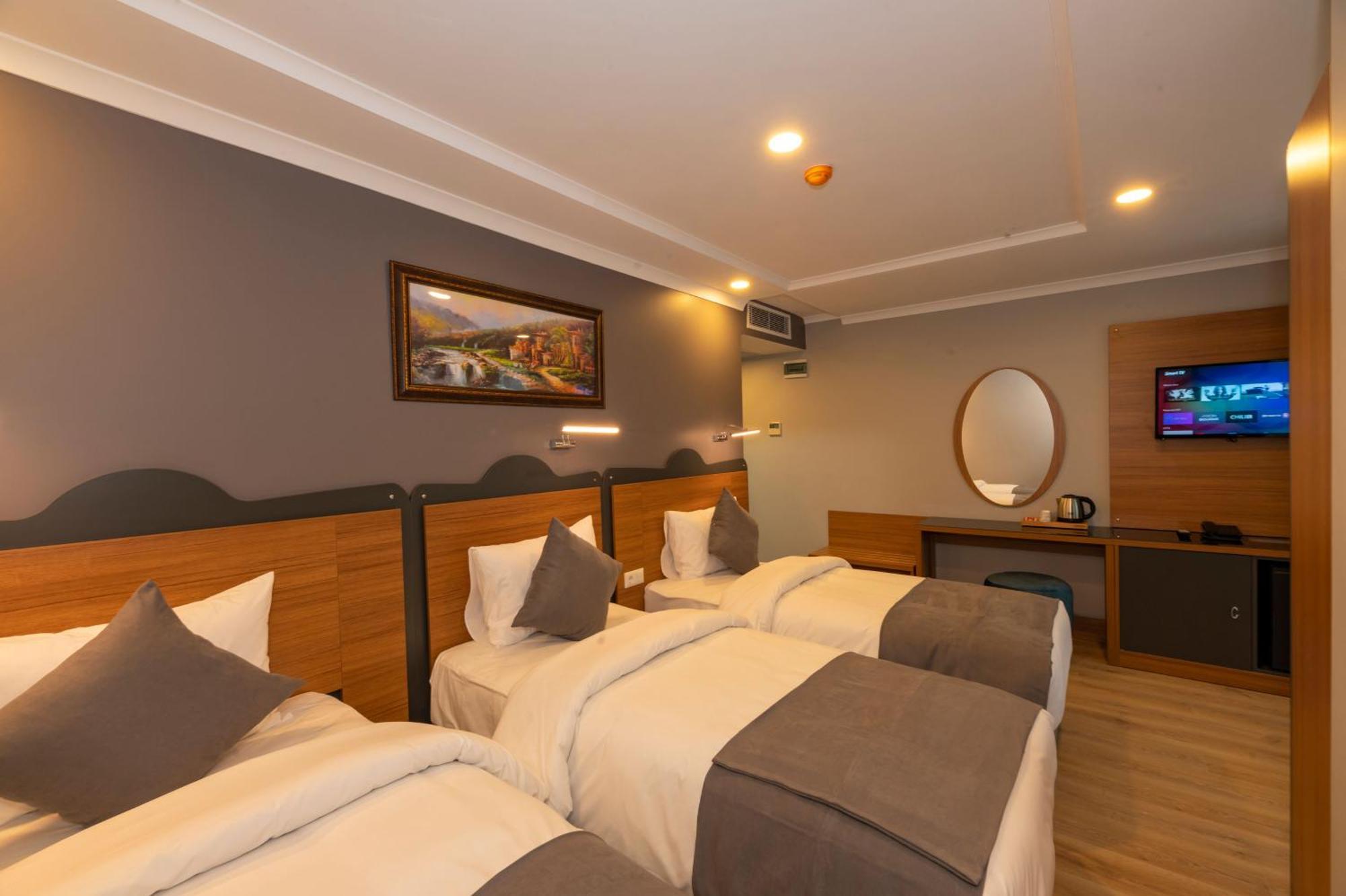 Deluxe Triple Room,1285822945:JPEG
