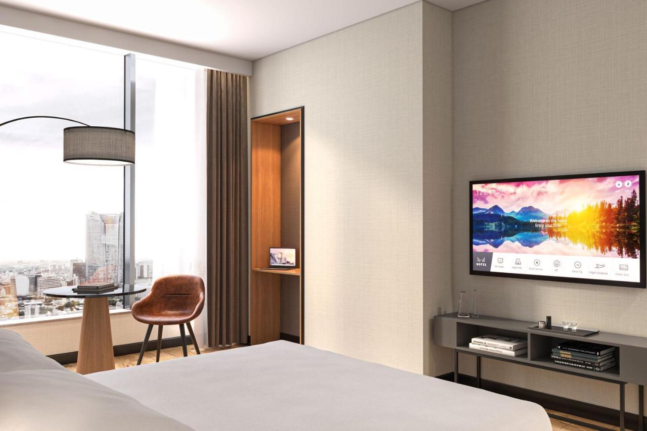Deluxe King Room Sofa Bed City View