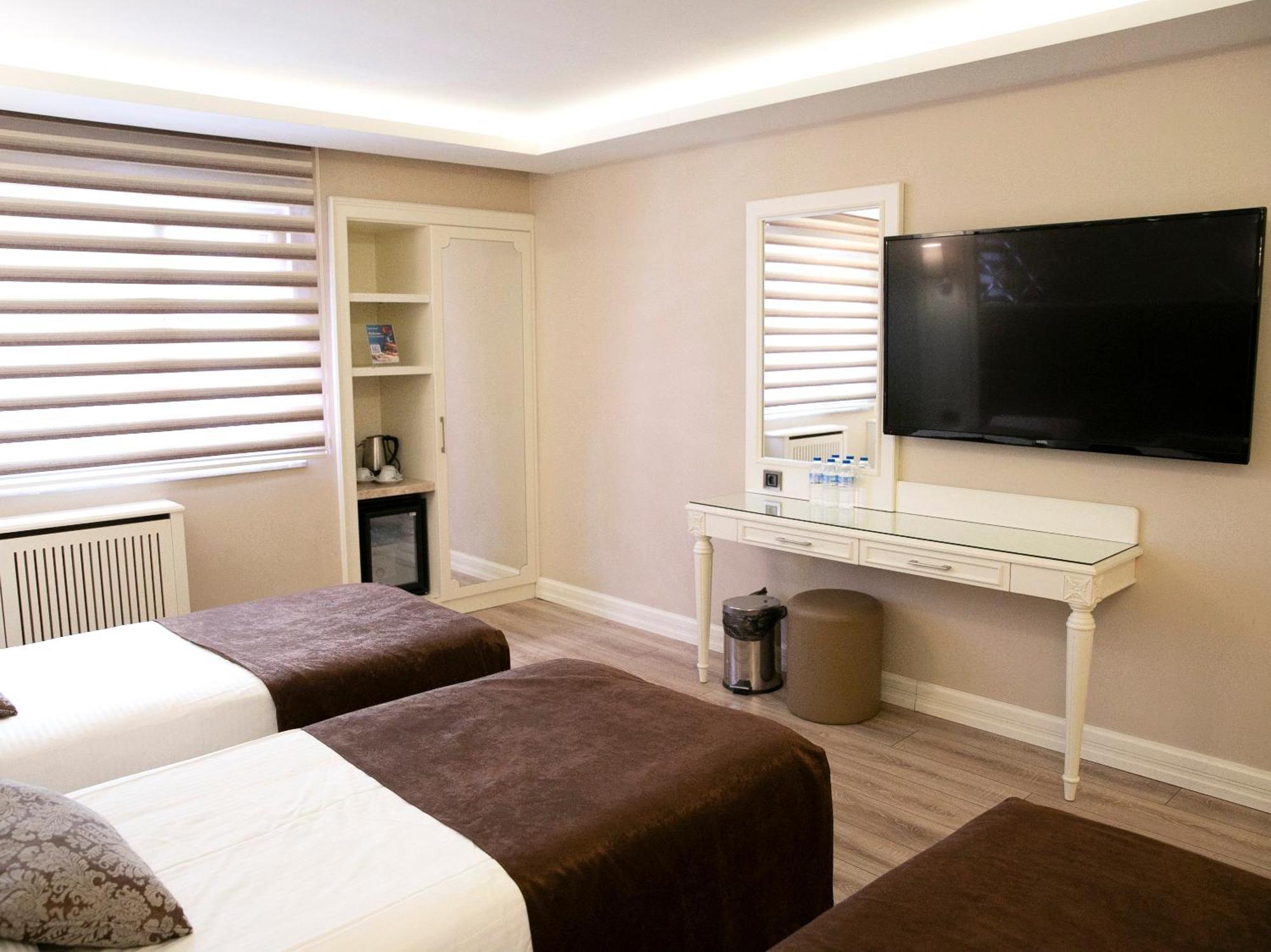 Deluxe Triple Room