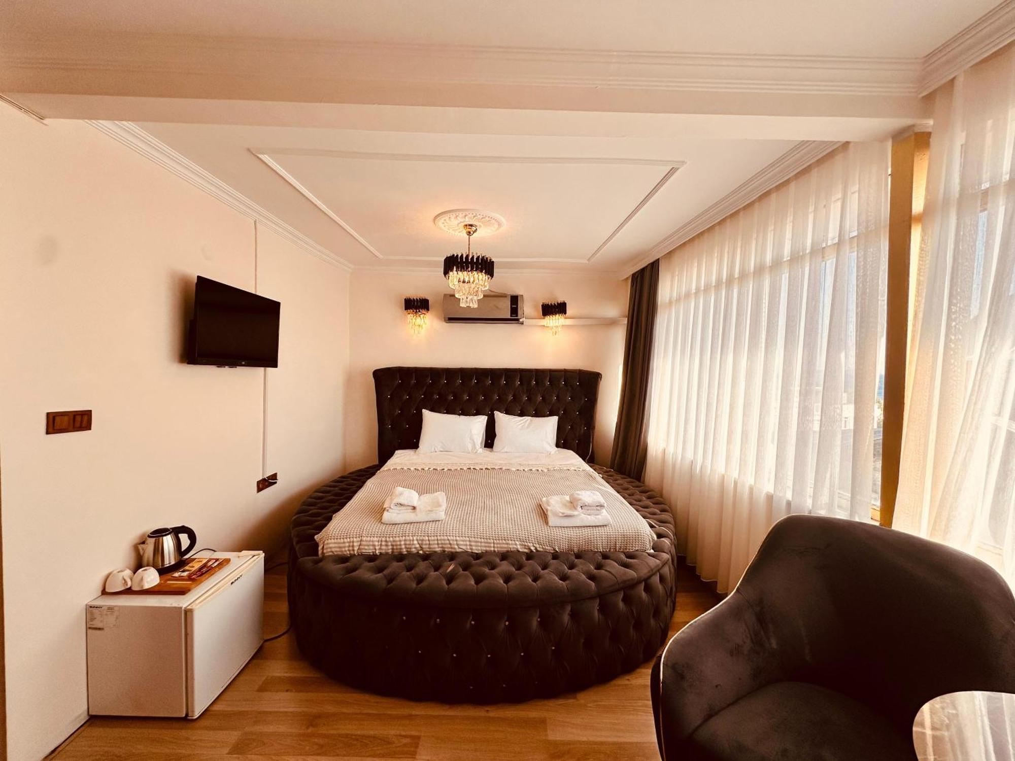 Chambre Lit King-Size avec Baignoire Spa