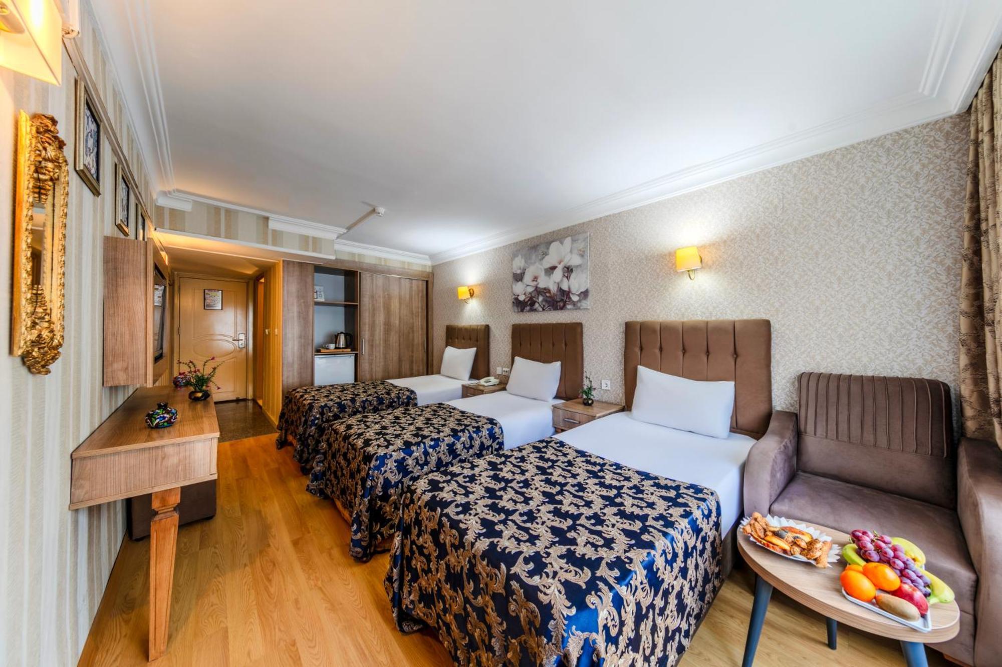 Deluxe Dreibettzimmer