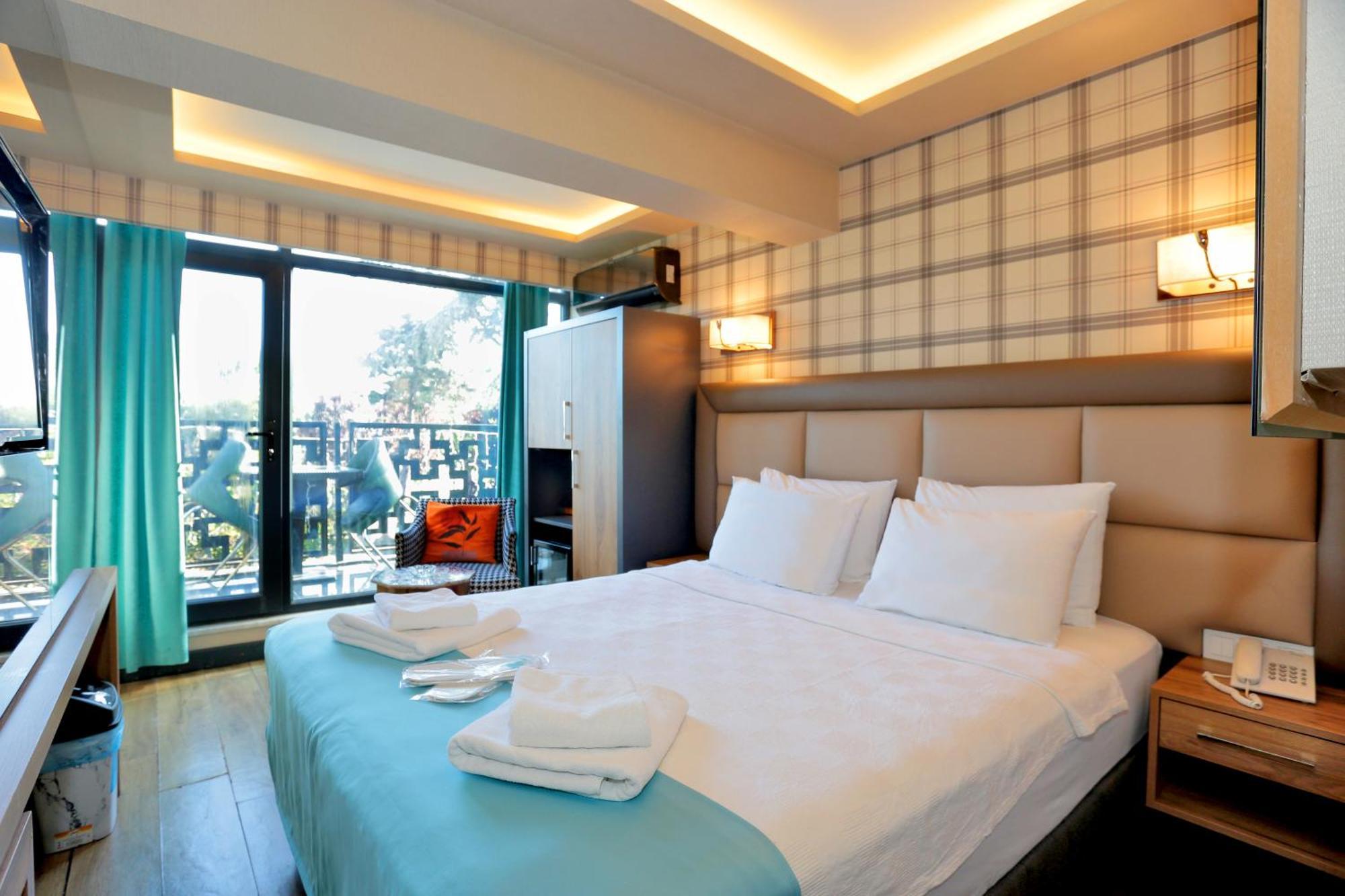 Habitación Doble Deluxe con balcón y vistas al mar