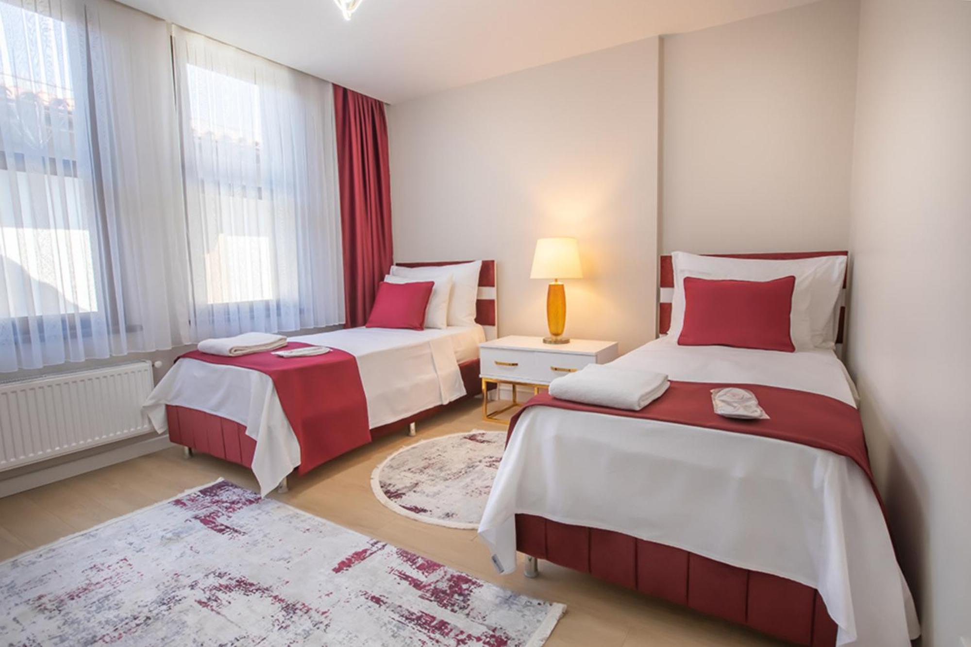 Appartamenti con Servizi Alberghieri con 1 Letto King Size e 2 Letti Singoli