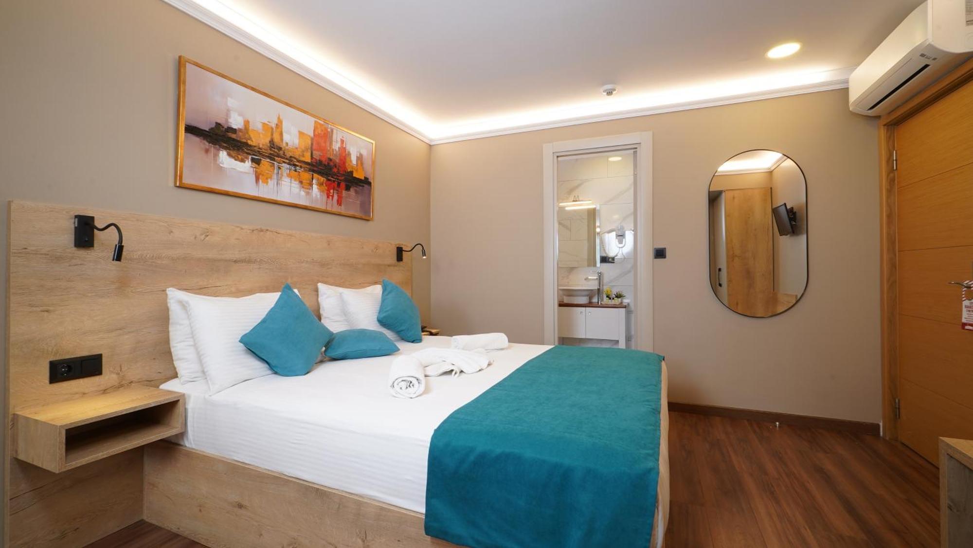 Quarto Duplo Deluxe (2 Adultos + 1 Criança)