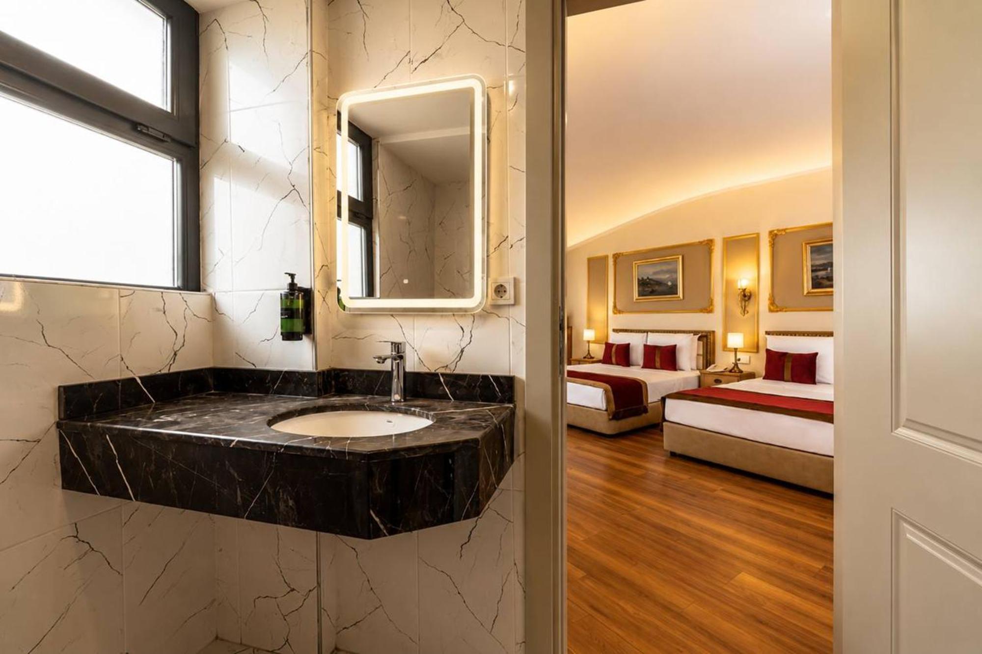 Chambre Quadruple Deluxe